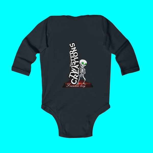 Black baby onesie with skeleton design and text on a turquoise background