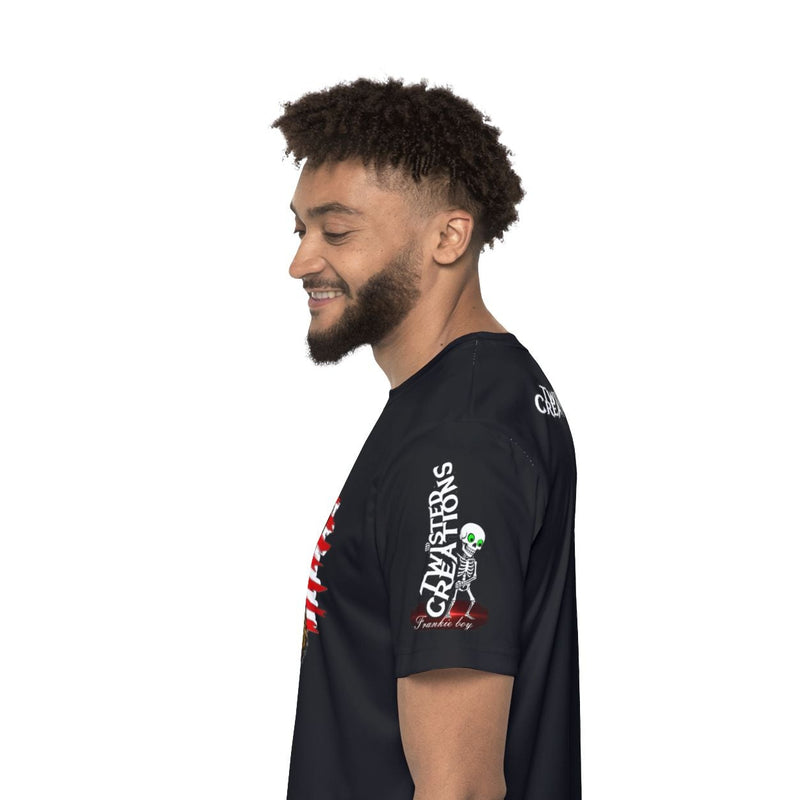 Man wearing a black t-shirt with colorful graphics on a white background